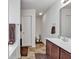 Spacious bathroom with double sinks, shower, and separate toilet area at 2009 Spring Valley Ct., Loris, SC 29569