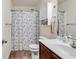 Clean bathroom with shower/tub combo, vanity, and tile floor at 2009 Spring Valley Ct., Loris, SC 29569