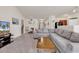 Spacious living room with sectional sofa and views to kitchen and stairs at 2009 Spring Valley Ct., Loris, SC 29569
