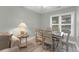 Dining area with table and chairs near a living room and kitchen at 4314 S Ocean Blvd. # B-1, North Myrtle Beach, SC 29582