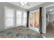 Bedroom with a queen bed, access to a balcony, and neutral decor at 4314 S Ocean Blvd. # B-1, North Myrtle Beach, SC 29582