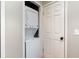 Convenient laundry closet with stackable washer and dryer at 4303 S Ocean Blvd. # 107, North Myrtle Beach, SC 29582