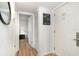 Clean and bright hallway with access to bedroom and closet at 4303 S Ocean Blvd. # 107, North Myrtle Beach, SC 29582