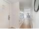 Bright entryway with bunk beds and view into living area at 4303 S Ocean Blvd. # 107, North Myrtle Beach, SC 29582