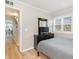 Bedroom with double bed, dresser, and view into hallway at 4303 S Ocean Blvd. # 107, North Myrtle Beach, SC 29582