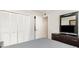 Bedroom with double bed, dresser, and built-in closet at 4303 S Ocean Blvd. # 107, North Myrtle Beach, SC 29582