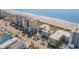 Aerial view of oceanfront property and surrounding area at 4303 S Ocean Blvd. # 107, North Myrtle Beach, SC 29582
