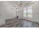 Bright dining room with hardwood floors and wainscoting at 1302 Surf Pointe Dr., North Myrtle Beach, SC 29582