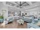 Spacious living room with hardwood floors, vaulted ceilings, and comfortable seating at 312 West Palms Dr., Myrtle Beach, SC 29579