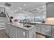 Open kitchen with large island and breakfast bar overlooking living area at 312 West Palms Dr., Myrtle Beach, SC 29579