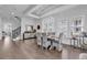 Bright dining room with hardwood floors and modern light fixture at 312 West Palms Dr., Myrtle Beach, SC 29579
