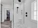 Spa-like bathroom with walk-in shower, hexagon tile flooring, and large closet at 312 West Palms Dr., Myrtle Beach, SC 29579