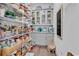 Walk-in pantry with ample shelving for storage at 312 West Palms Dr., Myrtle Beach, SC 29579