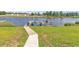 Private boat dock with walkway and lush lawn at 312 West Palms Dr., Myrtle Beach, SC 29579