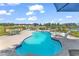 Inviting kidney-shaped pool with ample lounge space at 312 West Palms Dr., Myrtle Beach, SC 29579