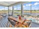 Relaxing screened porch overlooking a pool and waterway at 312 West Palms Dr., Myrtle Beach, SC 29579