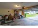 Attached garage with storage shelving and room for vehicles at 213 Birkdale Ln., Myrtle Beach, SC 29588