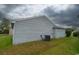 Side view of the home showcasing siding and AC unit at 213 Birkdale Ln., Myrtle Beach, SC 29588
