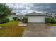 Charming one-story home with attached garage and landscaped front yard at 213 Birkdale Ln., Myrtle Beach, SC 29588