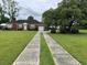 Brick ranch home with a large yard and long driveway at 880 Horry Rd., Aynor, SC 29511