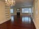 Living room with hardwood floors, fireplace and built-in shelving at 880 Horry Rd., Aynor, SC 29511