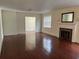 Living room boasts hardwood floors and a fireplace at 880 Horry Rd., Aynor, SC 29511