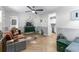 Living room boasts herringbone floors, stylish furniture, and an open layout at 6001 - N-45 S Kings Hwy., Myrtle Beach, SC 29575