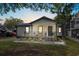 House exterior featuring a front porch and landscaping at 6001 - N-45 S Kings Hwy., Myrtle Beach, SC 29575