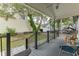 Front porch with rocking chairs, offering a relaxing outdoor space at 6001 - N-45 S Kings Hwy., Myrtle Beach, SC 29575