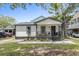 Newly constructed home with a metal roof and charming front porch at 6001 - N-45 S Kings Hwy., Myrtle Beach, SC 29575