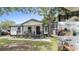Modern two-story house with a front porch, landscaped yard, and a detached garage at 6001 - N-45 S Kings Hwy., Myrtle Beach, SC 29575