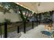 Relaxing front porch with string lights and seating area, overlooking the yard at 6001 - N-45 S Kings Hwy., Myrtle Beach, SC 29575