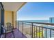Relaxing balcony with ocean views and seating for two at 6900 Ocean Blvd. N # 1205, Myrtle Beach, SC 29572