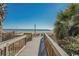 Convenient boardwalk path leads directly to the beach at 6900 Ocean Blvd. N # 1205, Myrtle Beach, SC 29572