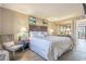 Main bedroom with a king bed and ocean view at 6900 Ocean Blvd. N # 1205, Myrtle Beach, SC 29572
