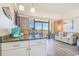 Well-equipped kitchen with granite countertops and breakfast bar at 6900 Ocean Blvd. N # 1205, Myrtle Beach, SC 29572