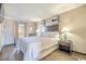 King-size bed in a bright bedroom with ocean views at 6900 Ocean Blvd. N # 1205, Myrtle Beach, SC 29572
