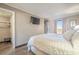 Bedroom with a queen bed, TV, and closet at 6900 Ocean Blvd. N # 1205, Myrtle Beach, SC 29572