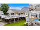 Elevated beach house with wrap-around porch and large deck at 6001 - 1550 S Kings Hwy., Myrtle Beach, SC 29575