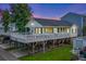 Elevated home with a large deck and beautiful sunset views at 6001 - 1550 S Kings Hwy., Myrtle Beach, SC 29575
