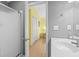 Small bathroom with shower and single sink vanity at 6001 - 1550 S Kings Hwy., Myrtle Beach, SC 29575