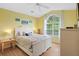 Spacious bedroom with vaulted ceiling, large window, and hardwood floor at 6001 - 1550 S Kings Hwy., Myrtle Beach, SC 29575