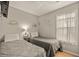 Guest bedroom with twin beds and gray bedding at 6001 - 1550 S Kings Hwy., Myrtle Beach, SC 29575