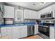 Modern kitchen with stainless steel appliances and blue countertops at 6001 - 1550 S Kings Hwy., Myrtle Beach, SC 29575