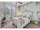 Bright bedroom with a queen bed and leafy wall decor at 5188 Country Pine Dr., Myrtle Beach, SC 29579
