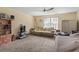 Versatile bonus room with a couch and shelving at 5188 Country Pine Dr., Myrtle Beach, SC 29579