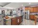 Open kitchen with stainless steel appliances and an island at 5188 Country Pine Dr., Myrtle Beach, SC 29579