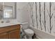 Clean bathroom with tub shower and wood vanity at 5188 Country Pine Dr., Myrtle Beach, SC 29579