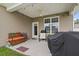 Covered patio with ceiling fan and grill at 5188 Country Pine Dr., Myrtle Beach, SC 29579