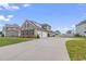 Tan house with driveway and landscaping at 5188 Country Pine Dr., Myrtle Beach, SC 29579